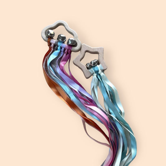 wooden shape with bells and ribbon